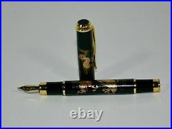 Original fountain pen has a modern maki-e of Dragon in the clouds with paulownia